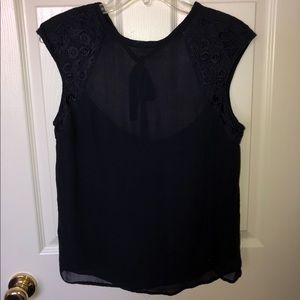 Blouse with deep back, and detail around arm